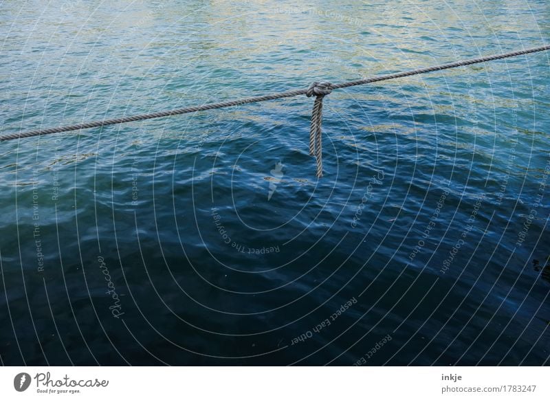 sailor knot Water Ocean Navigation Harbour Rope Line Knot To hold on Simple Firm Maritime Blue Safety Surface of water Smoothness Sea water Bind fast Diagonal