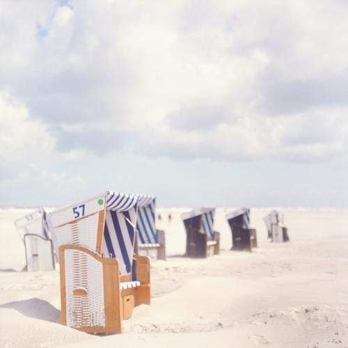 beach chair whispering Colour photo Exterior shot Copy Space top Day Light Landscape Sky Clouds Beautiful weather Beach North Sea Ocean To enjoy Bright Blue