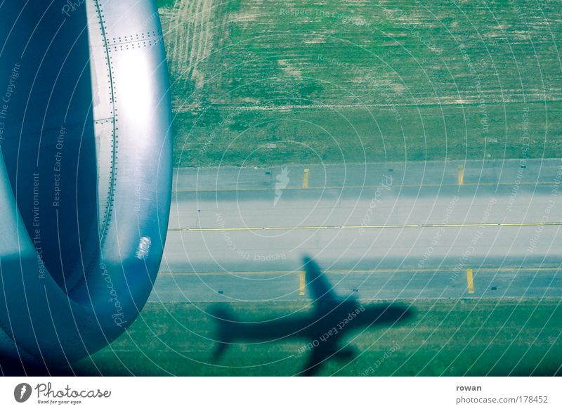 Withdrawn Colour photo Subdued colour Copy Space right Copy Space top Day Shadow Aviation Airplane Passenger plane Airport Airfield Runway Airplane landing