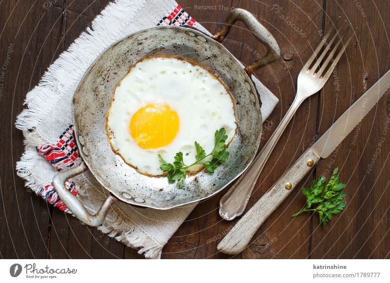Fried egg with herbs Vegetable Eating Breakfast Dinner Pan Table Fresh Green Red White Cholesterol Eggshell Frying Meal Protein Rustic Unhealthy Parsley