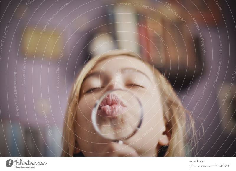 child with magnifying glass and kissing mouth Girl Woman Youth (Young adults) Young woman Face Lips Magnifying glass Enlarged Passion Kissing Lens Child Infancy