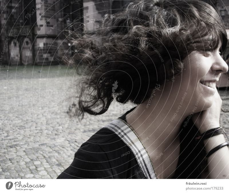 a smile from her... Exterior shot Day Shadow Sunlight Motion blur Central perspective Looking away Joy Hair and hairstyles Skin Human being Feminine Young woman