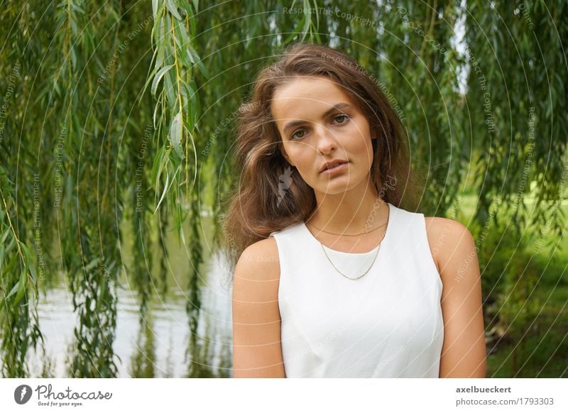 young woman wearing white dress in a park Lifestyle Leisure and hobbies Garden Human being Feminine Young woman Youth (Young adults) Woman Adults 1