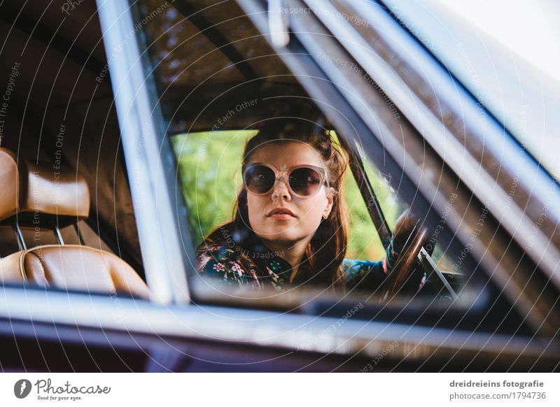 Retro girl. Lifestyle Style Feminine Woman Adults Motoring Car Vintage car Sports car Sunglasses Brunette Driving Looking Sit Cool (slang) Success Hip & trendy