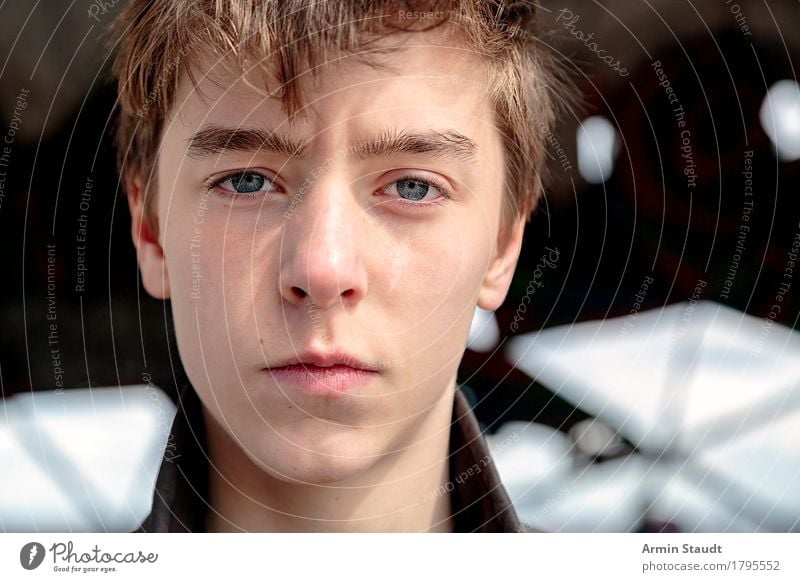 Portrait of a serious teenager Lifestyle Style pretty Human being Masculine Young man Youth (Young adults) Head Face 1 13 - 18 years Uniqueness Emotions