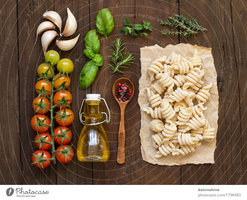 Italian pasta, vegetables, herbs and olive oil Vegetable Dough Baked goods Herbs and spices Cooking oil Vegetarian diet Diet Bottle Spoon Table Leaf Dark Fresh