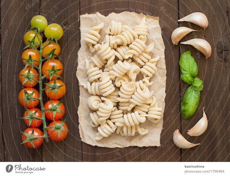 Raw italian pasta, basil and vegetables Vegetable Dough Baked goods Herbs and spices Vegetarian diet Diet Dark Fresh Healthy Brown Green Red Basil cooking food