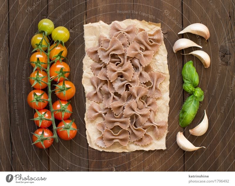 Raw farfalle pasta, basil and vegetables Vegetable Dough Baked goods Herbs and spices Vegetarian diet Diet Dark Fresh Brown Green Red Tradition Basil cooking