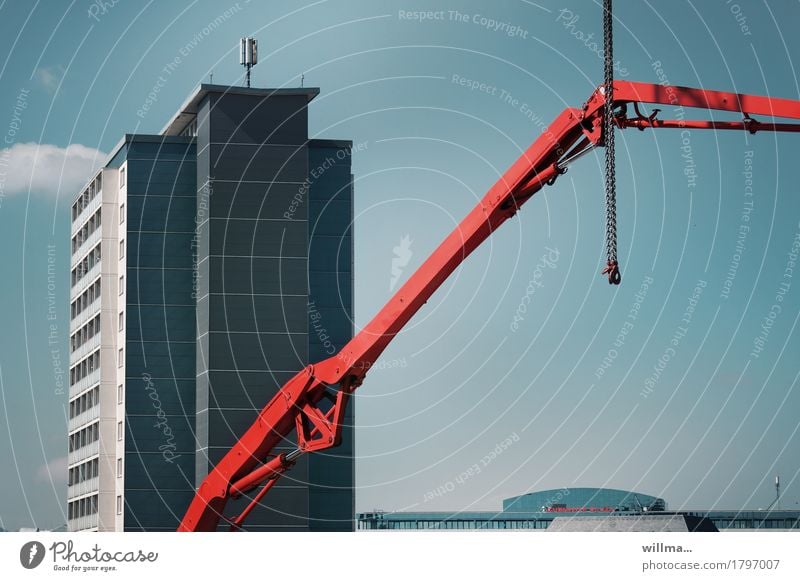 legal position Crane crane arm Chain Construction site High-rise housing Chemnitz Manmade structures Building Architecture Blue Red Emphasis Hydraulics Day