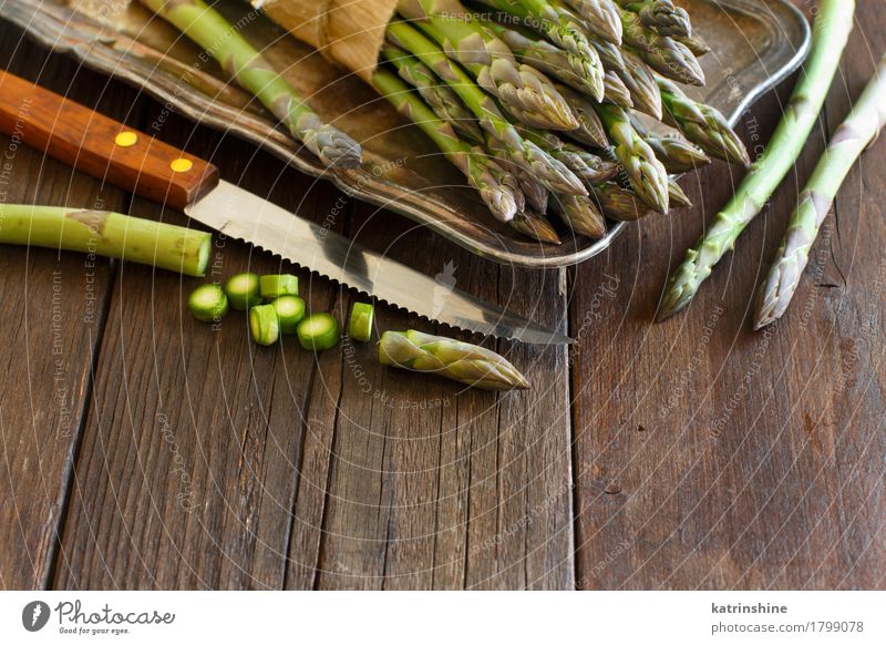 Fresh asparagus with knife Food Vegetable Nutrition Dinner Vegetarian diet Diet Knives Table Dark Healthy Natural Brown Green Asparagus Gourmet wood Sliced