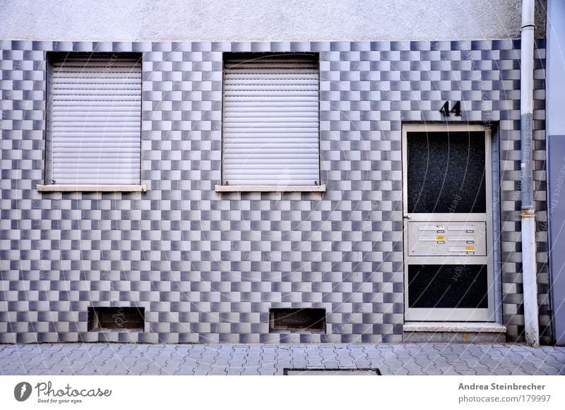 facade monotony Colour photo Subdued colour Exterior shot Pattern Deserted Day Central perspective Flat (apartment) Village Town House (Residential Structure)