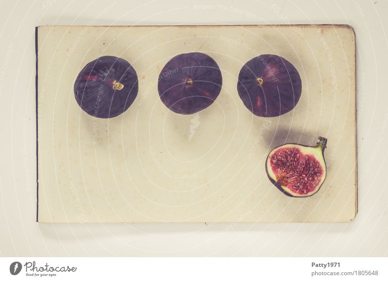 figs Food Fruit Fig Nutrition Vegetarian diet Paper Piece of paper Fresh Healthy Retro Round Juicy Sweet Violet Red Still Life Colour photo Studio shot Deserted