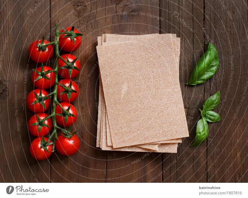 Whole wheat lasagna sheets, tomatoes and basil Vegetable Dough Baked goods Herbs and spices Vegetarian diet Diet Italian Food Table Leaf Dark Fresh Healthy