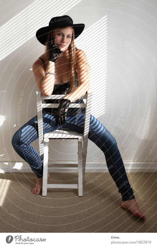 . Chair Room Feminine 1 Human being T-shirt Jeans Gloves Hat Blonde Long-haired Observe To hold on Looking Sit Beautiful Self-confident Cool (slang) Power