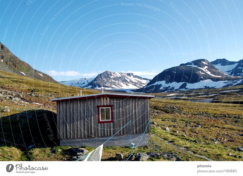 Mountain hut in Sweden Colour photo Exterior shot Deserted Copy Space top Day Deep depth of field Sky Beautiful weather Rock Snowcapped peak Hut Relaxation