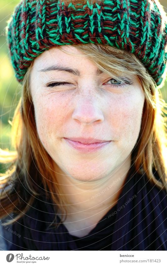 See ya ! Woman Human being Youth (Young adults) Europe Freckles Cap Woolen hat Autumn Winter Portrait photograph Wink Eyes Close-up Laughter Smiling Joy Nature