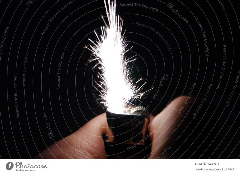 {Hand}FEUER[werk](witness) Colour photo Close-up Light (Natural Phenomenon) Lighter Hot Bright Spark Flame sparks lightning bolt Explosion tongue of flame