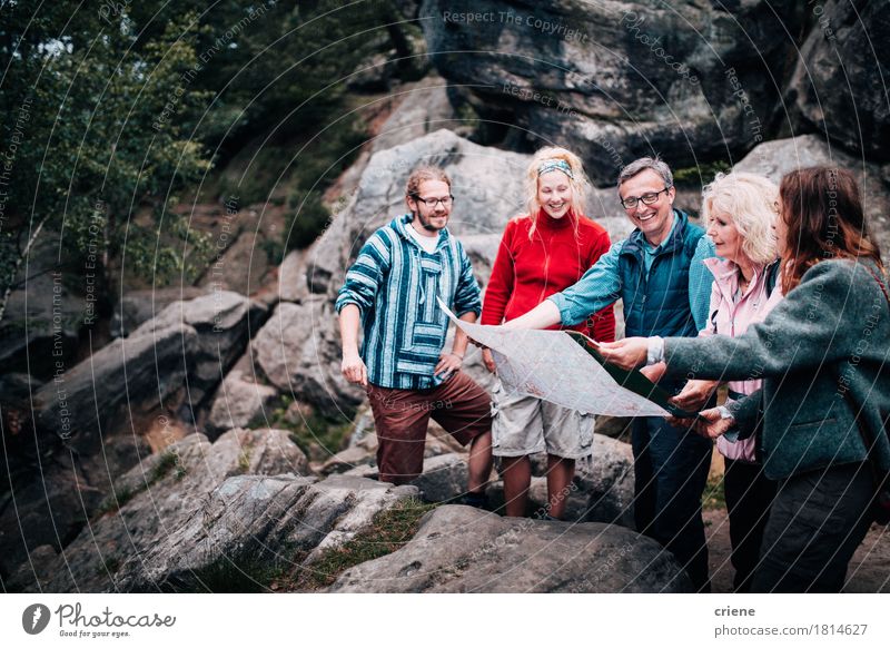 Group of mixed aged people following tour guide Lifestyle Joy Leisure and hobbies Tourism Mountain Hiking Mother Adults Father Family & Relations Senior citizen