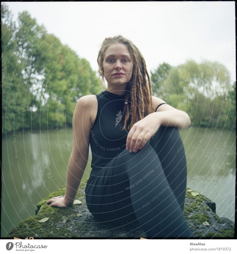definite Trip Adventure Young woman Youth (Young adults) Dreadlocks 18 - 30 years Adults Youth culture Nature Landscape Tree Lakeside Pontoon Concrete Dress