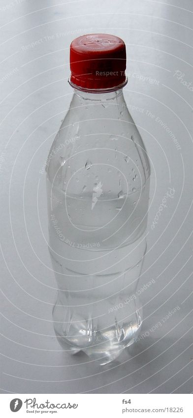 Half empty Transparent Nutrition Bottle Water