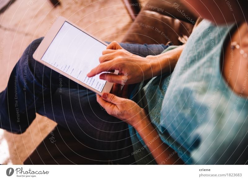 Close-up of Woman using Digital Tablet at Home in Modern house Lifestyle Shopping Reading Flat (apartment) House (Residential Structure) Business SME Computer