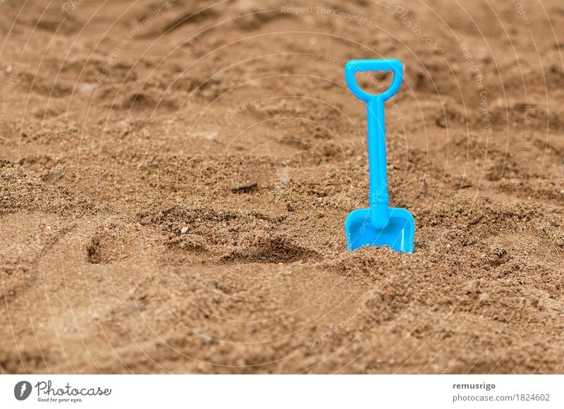 Sandpit shovel in the sand Joy Playing Vacation & Travel Summer Beach Ocean Kindergarten Child Toys Plastic Dirty Blue holiday kid sandbox Colour photo