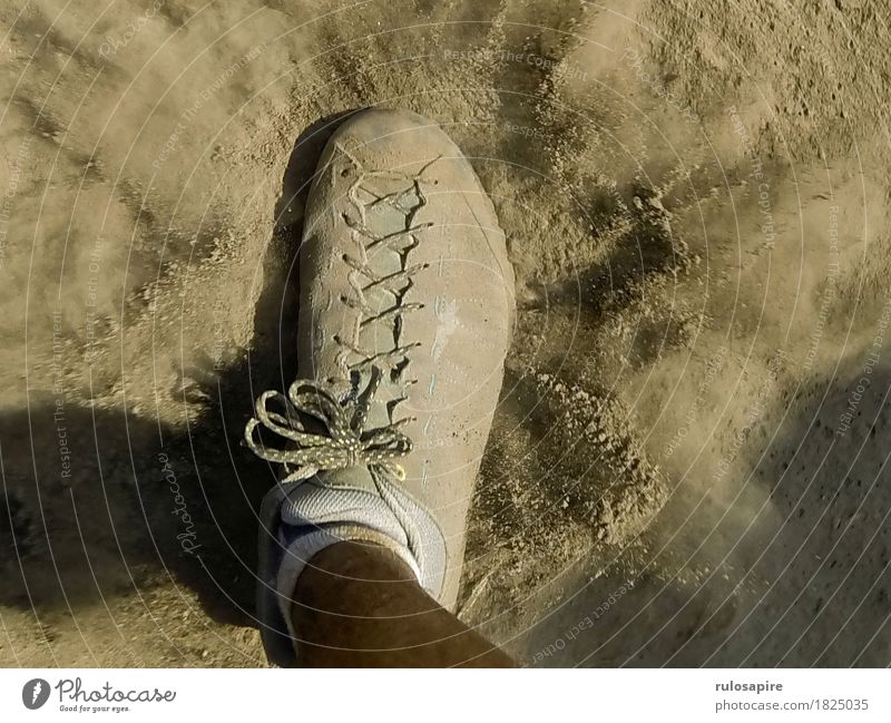 Dust Explosion 2 Feet Going Footwear Dusty Cloud of dust Lanes & trails Gray Beige Shoelace Stride Hiking Footstep Occur whirl up Colour photo Subdued colour