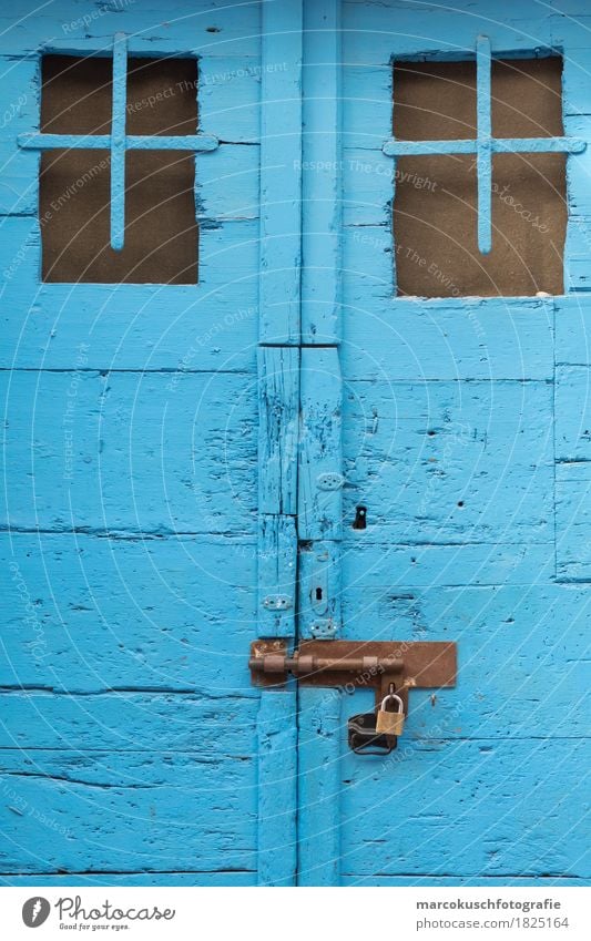 Blue door Village Old town Door Beautiful Vintage Lock Doorframe Croatia Mediterranean sea Dry Wood Wooden door Crack & Rip & Tear Colour Flake off Keyhole