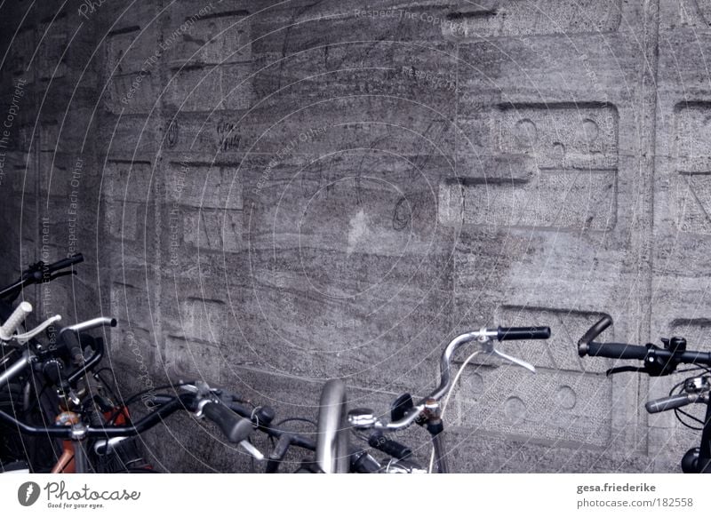 the negative Design Art Wall (barrier) Wall (building) Facade Stone Concrete Emotions Moody Authentic Uniqueness Bicycle Vandalism Structures and shapes