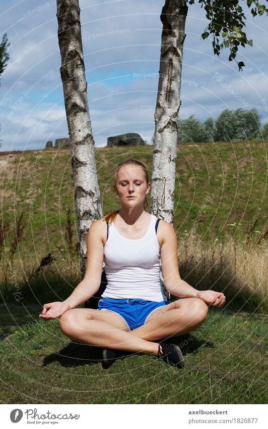 young woman meditating Lifestyle Athletic Fitness Wellness Harmonious Well-being Relaxation Meditation Leisure and hobbies Summer Sports Sports Training Yoga