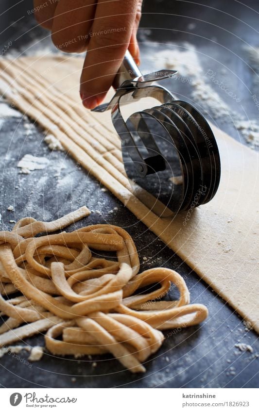 Making Spaghetti Alla Chitarra With A Tool Stock Photo - Download