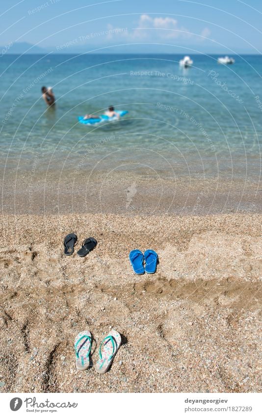 Slippers in the sand on the beach Relaxation Leisure and hobbies Vacation & Travel Tourism Summer Beach Ocean Woman Adults Nature Sand Sky Coast Footwear Blue