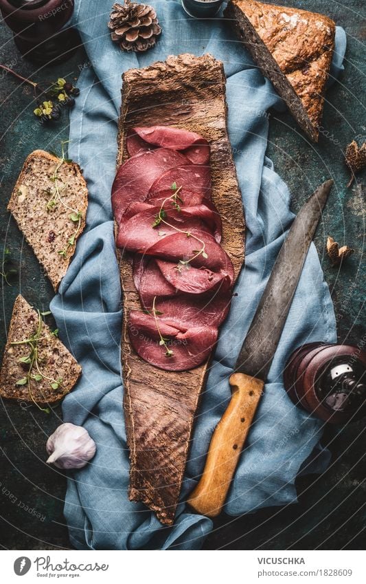 Venison ham with nut bread served on tree bark Food Meat Sausage Bread Nutrition Lunch Dinner Organic produce Knives Style Design Healthy Eating