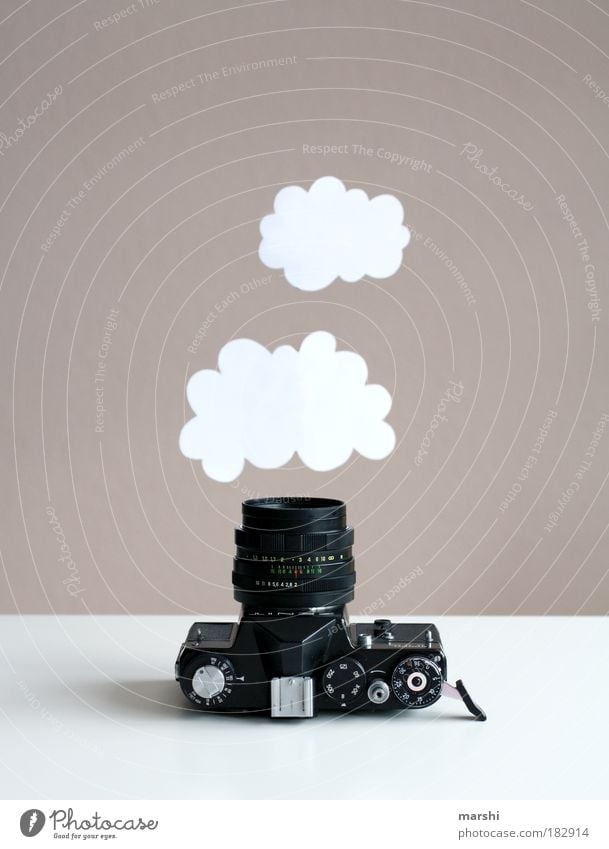 Capturing dream clouds Colour photo Interior shot Style Leisure and hobbies Clouds Hang Old White Camera Photography Take a photo Photographer Analog Capture
