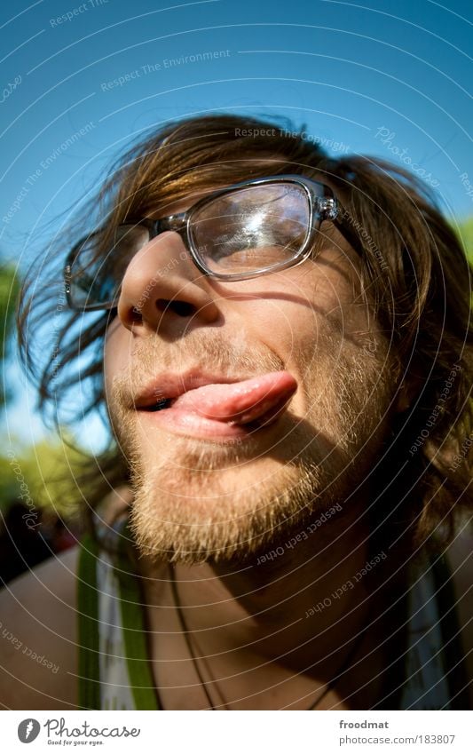 tongue twister Colour photo Multicoloured Exterior shot Day Light Portrait photograph Front view Forward Human being Masculine Young man Youth (Young adults)