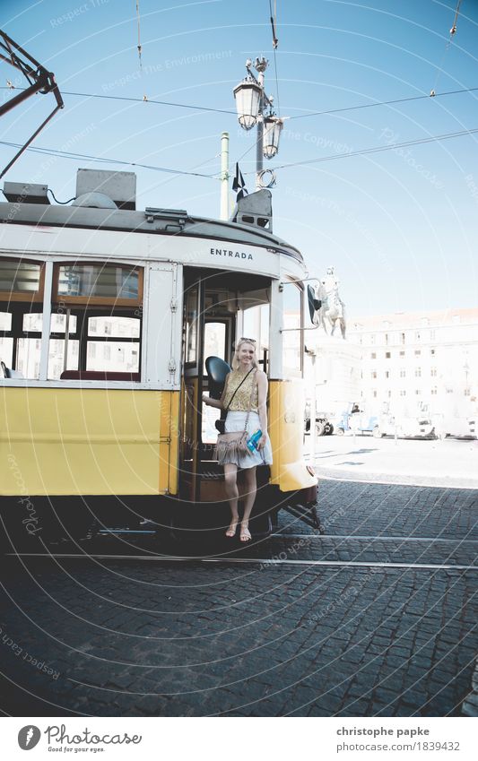 Woman in front of historic tram in Lisbon Tram Historic Characteristic Portugal Downtown Old Vacation & Travel Tourism Summer vacation City trip Day