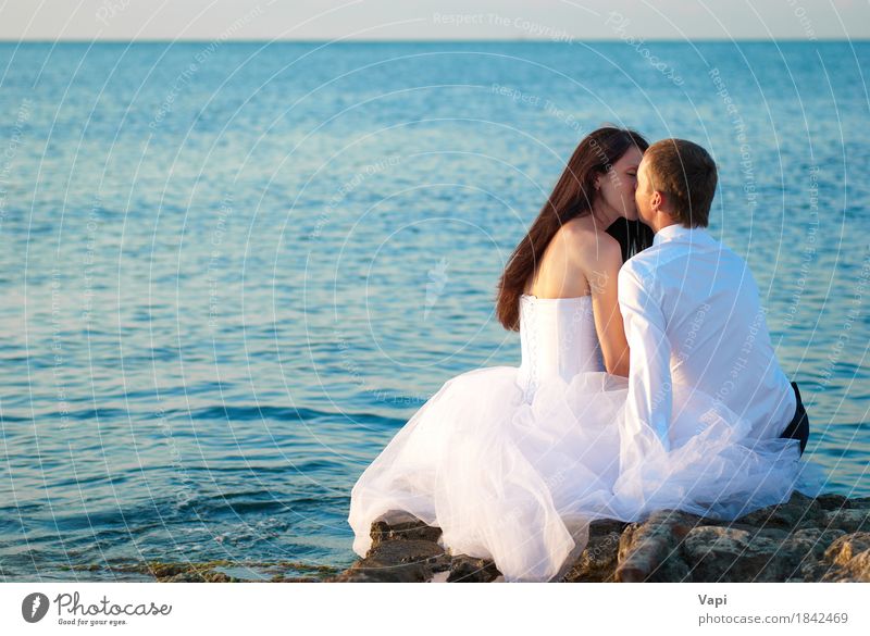 Beautiful wedding couple at the beach Lifestyle Elegant Summer Beach Ocean Island Waves Valentine's Day Wedding Human being Young woman Youth (Young adults)
