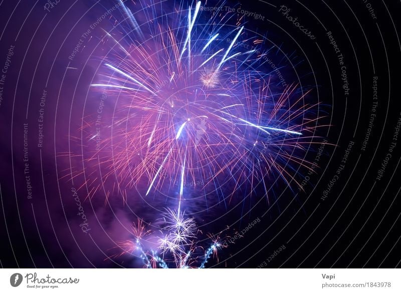 Blue and purple colorful holiday fireworks Joy Beautiful Night life Entertainment Party Event Feasts & Celebrations Christmas & Advent New Year's Eve Sky