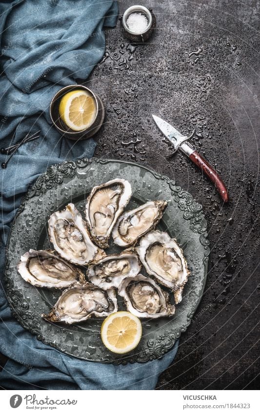 Oysters with lemon and oyster knife Food Seafood Nutrition Lunch Dinner Buffet Brunch Banquet Crockery Plate Knives Style Design Healthy Eating Life Table