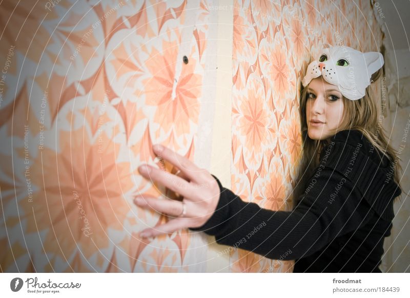 papergirl Colour photo Subdued colour Interior shot Day Light Wide angle Upper body Front view Looking into the camera Wallpaper Human being Feminine Mask