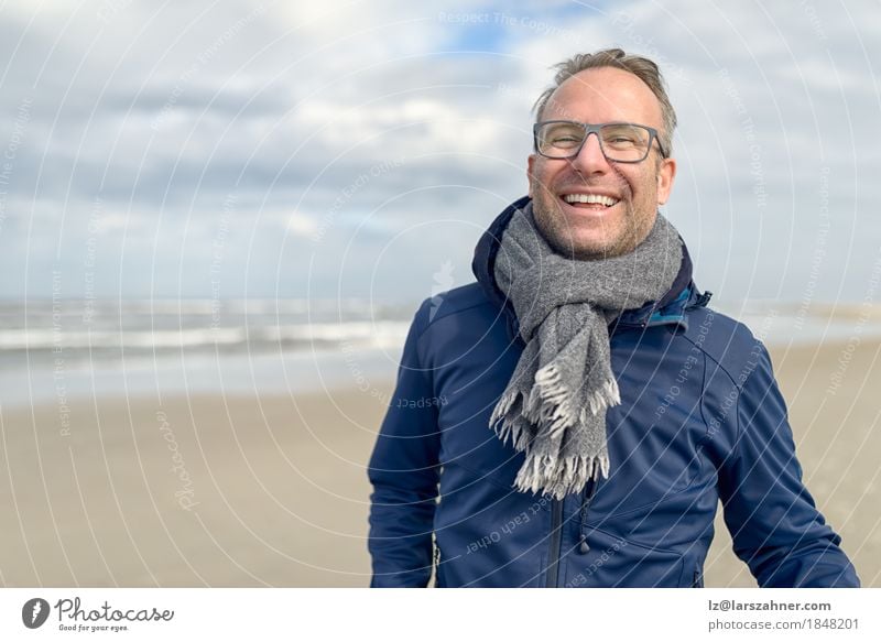 Happy laughing middle-aged man with glasses Lifestyle Face Relaxation Vacation & Travel Tourism Beach Ocean Man Adults 1 Human being 30 - 45 years Autumn Wind