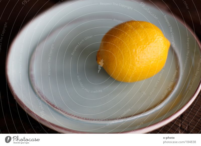 angry. Colour photo Interior shot Food Fruit Plate Sour Yellow Nutrition