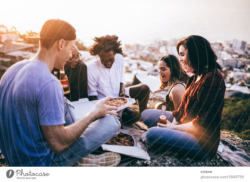 Mutli-ethnical Group enjoying pizza and drinks at sunset Eating Fast food Beverage Drinking Beer Lifestyle Joy Summer Party Going out Feasts & Celebrations