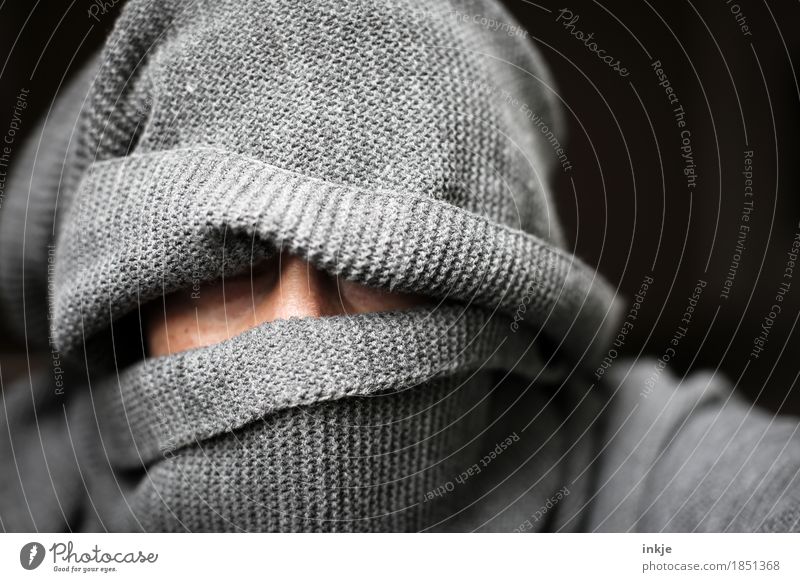 grey figure Human being Woman Adults Man Life Head Face 1 Scarf Cap Knitted Threat Dark Masked Wrapped in Gray Woolen hat Dark background Concealed Mysterious