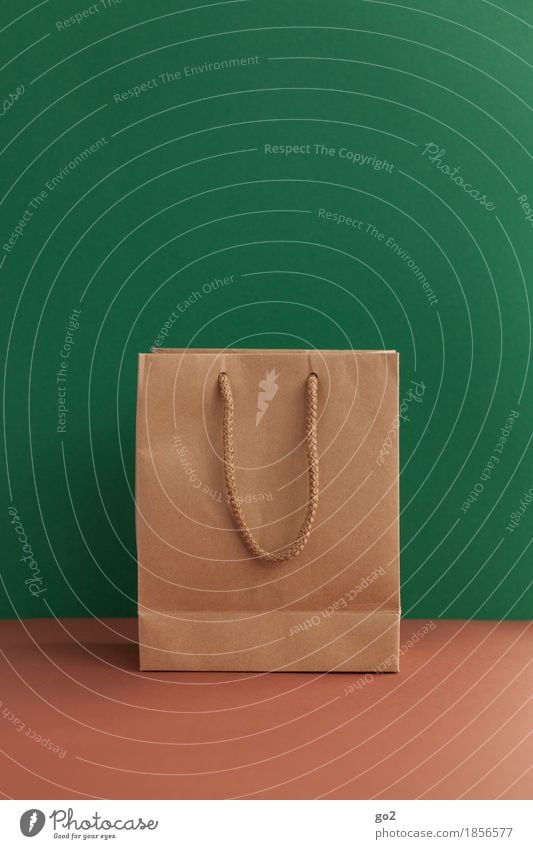 gift bag Shopping Christmas & Advent Paper bag Bag Gift Brown Green Trade Empty Colour photo Interior shot Studio shot Close-up Deserted Copy Space left