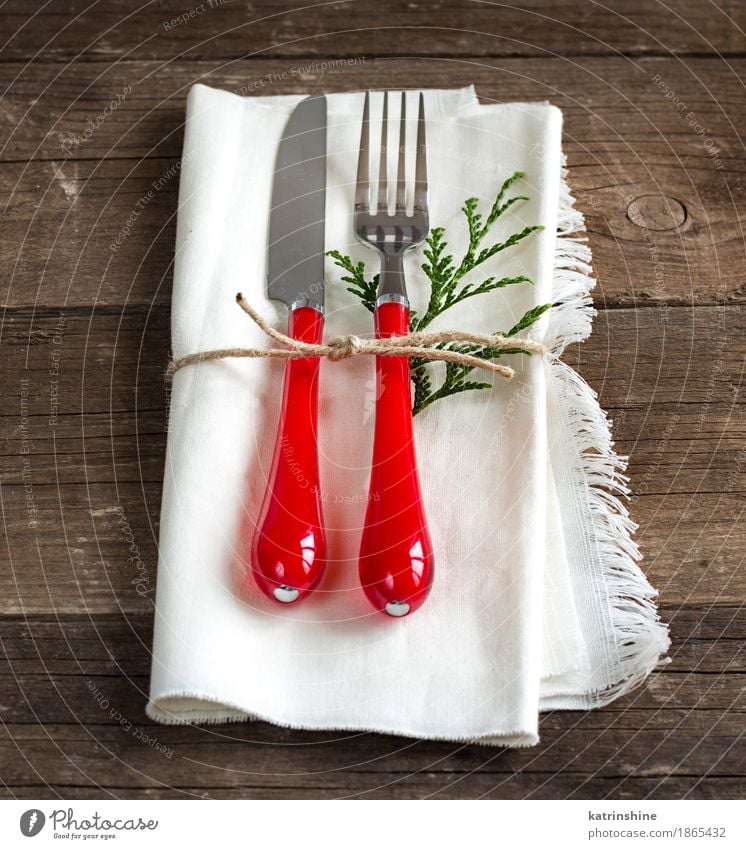 Festive table setting with napkin Dinner Cutlery Knives Fork Elegant Design Table Feasts & Celebrations Christmas & Advent New Year's Eve Places Wood Metal