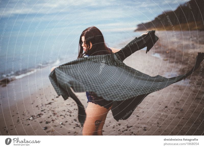 In the wind. Lifestyle Style Happy Freedom Human being Woman Adults 1 Sand Water Coast Beach Underwear Cape To enjoy Dance Authentic Blue Emotions