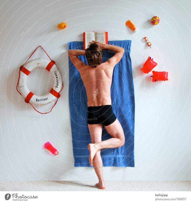 holiday in(-house) Lifestyle Wellness Relaxation Calm Spa Leisure and hobbies Reading Swimming pool Man Adults 1 Human being Whimsical Towel Life belt
