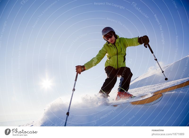 Freeride skier Sun Winter Snow Mountain Sports Skiing Boy (child) Man Adults Landscape Sky Cold Blue Green Loneliness Afternoon back-light Clear sky Extreme