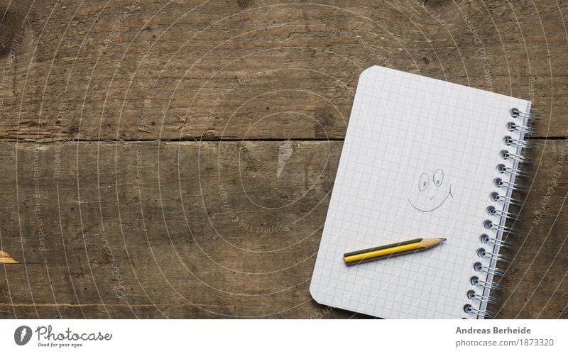 a smile Contentment Desk Office Business Musical notes Print media Paper Piece of paper Pen Smiling Happiness book table spiral Background picture white notepad